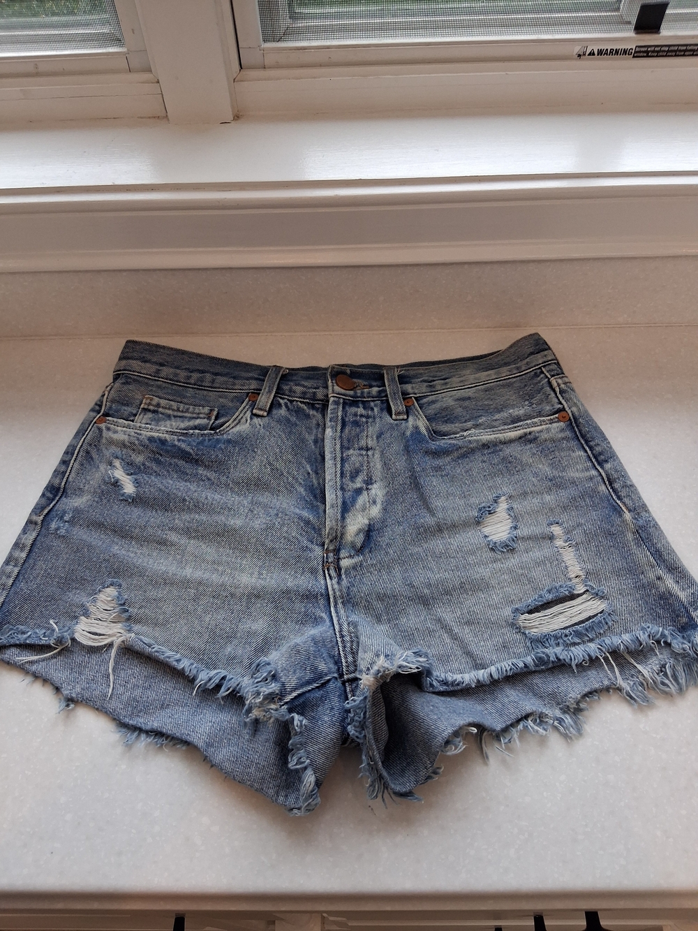 Blank NYC Distressed Light Blue Denim Cutoff Shorts
